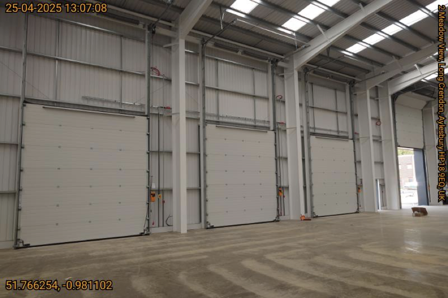 4 electrically operated insulated sectional level access doors 4 electrically operated insulated sectional level access doors